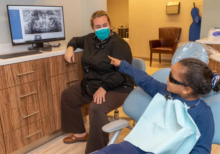 dentist consulting with patient marion, ma
